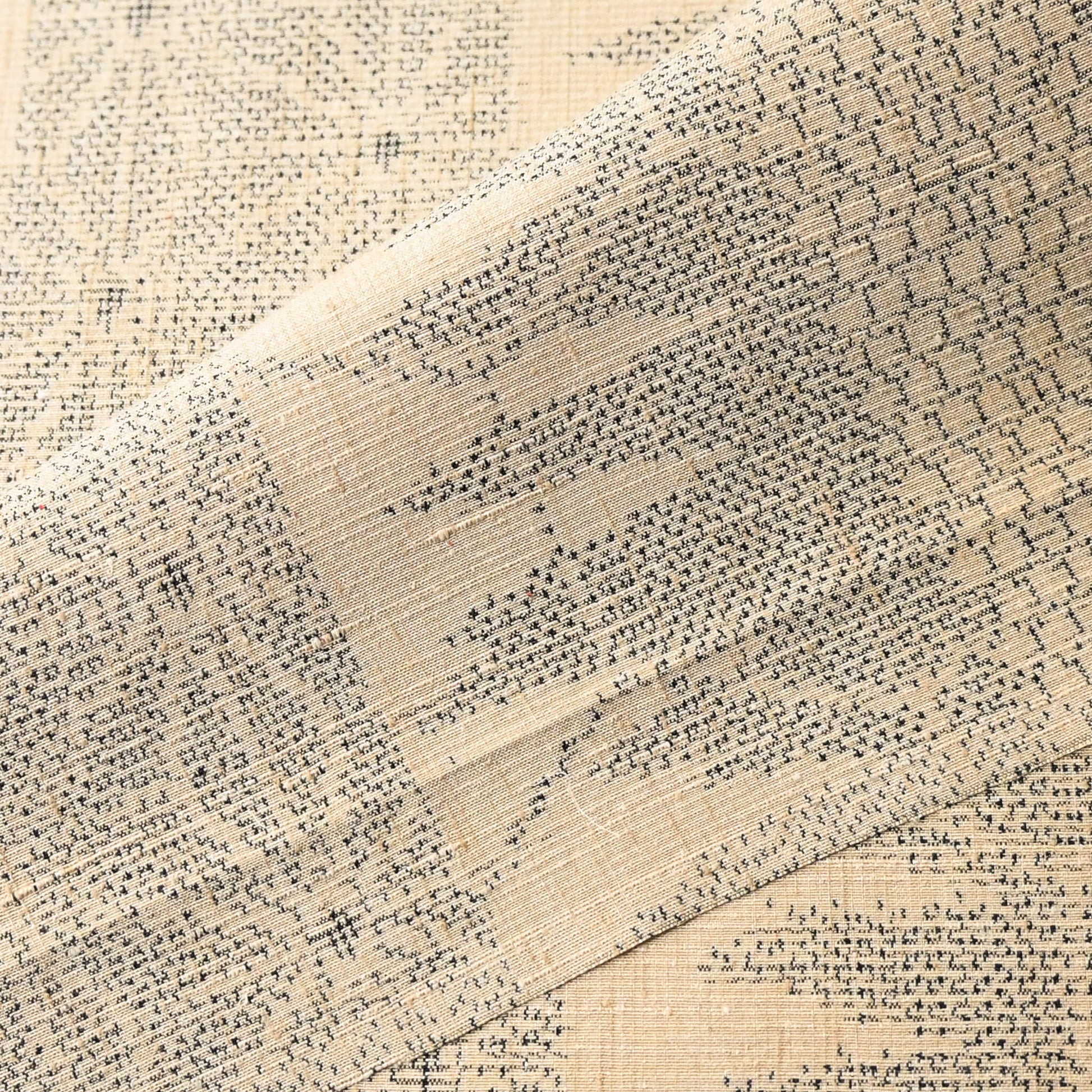 Detailed view of vintage tsumugi silk kimono fabric weave and texture.